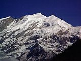 410 Tukuche Peak Early Morning From Lete Tukuche Peak in the early morning sun from Lete. Tukuche Peak (6920m) was first climbed on May 10, 1969 via the Dambush pass and northwest face by Swiss expedition leader Georges Hartmann, Alois Strictler, and Sherpa Sonam Girmi. Three days later Ruedi Homberger and Andreas Hirsbrunner repeated the ascent of the main peak.